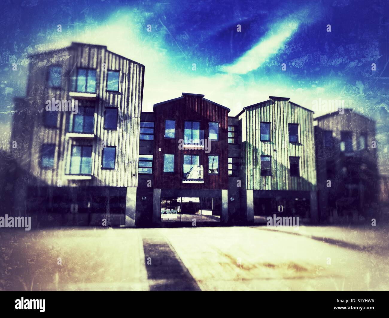 Newly built apartments 2018 on the former Whisstocks boat yard, Woodbridge, Suffolk, UK. - Smartphone Captured Stock Image