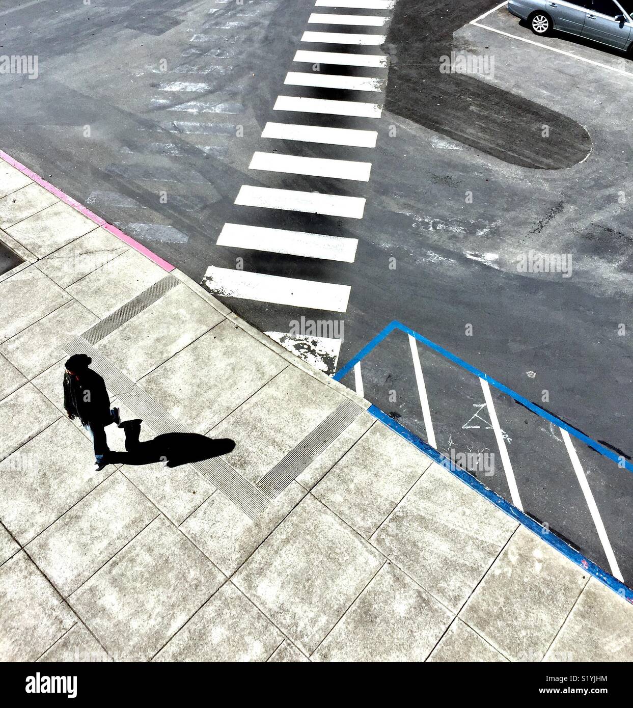 Pedestrian and crosswalk. - Smartphone Captured Stock Image