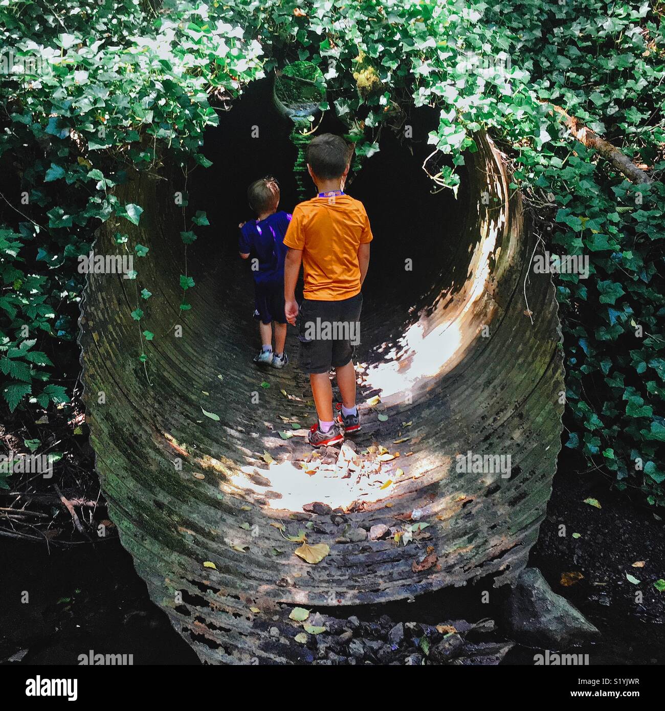 Boy in tunnel Stock Photo Alamy