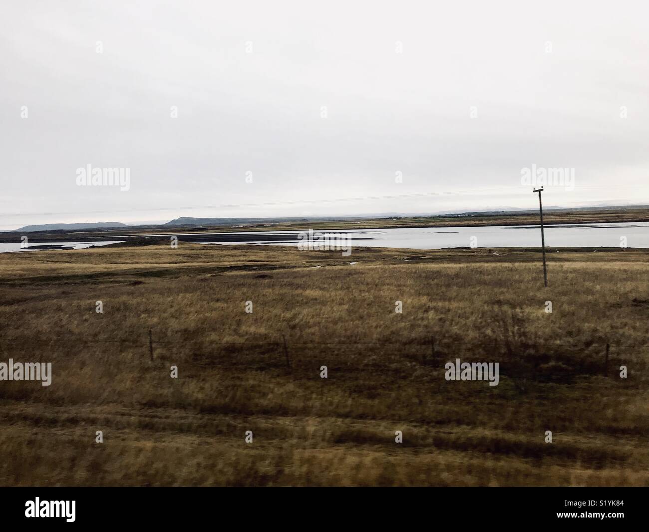 Desolate land with river Stock Photo Alamy