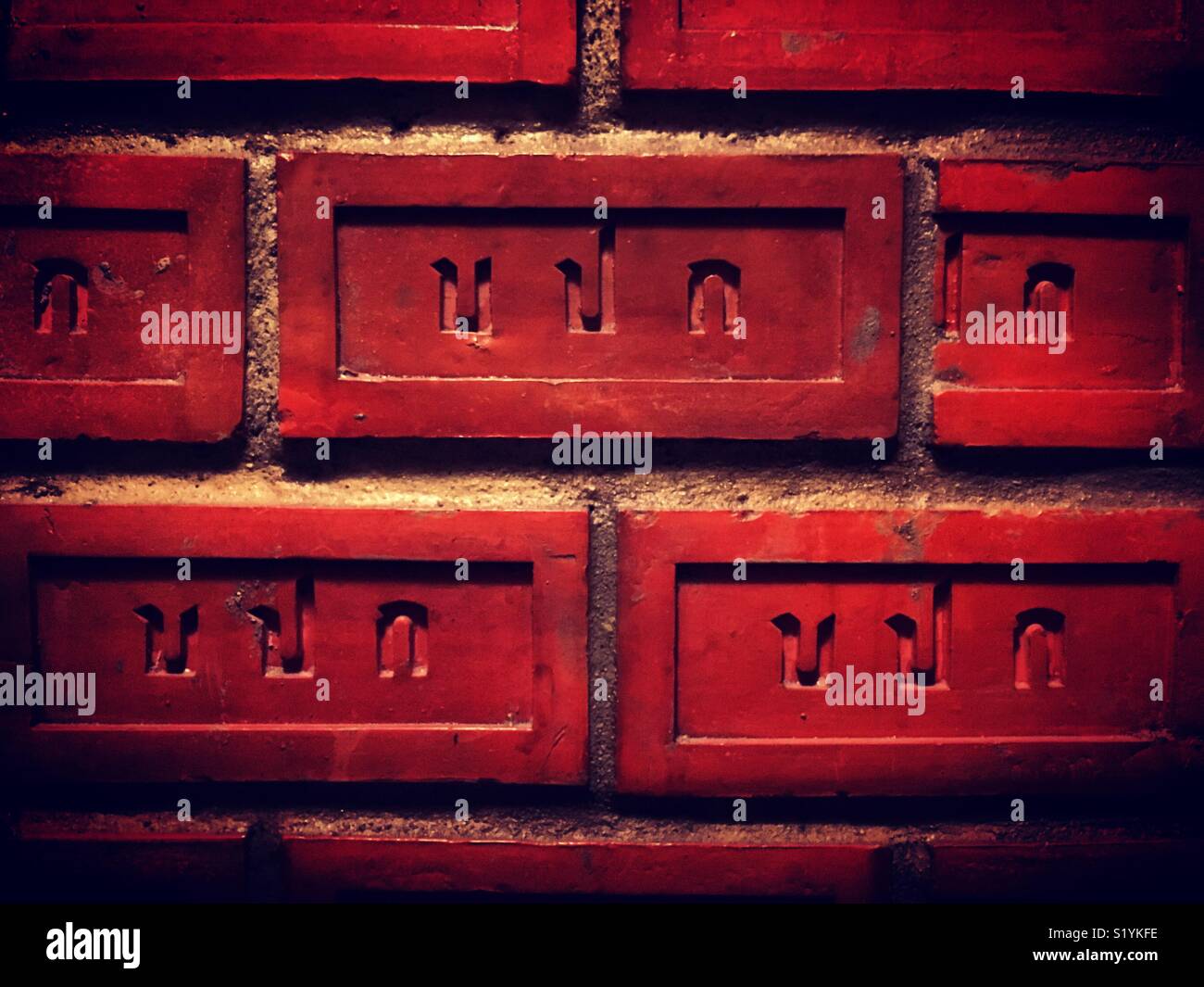 Bricks wall with Thai characters - Smartphone Captured Stock Image