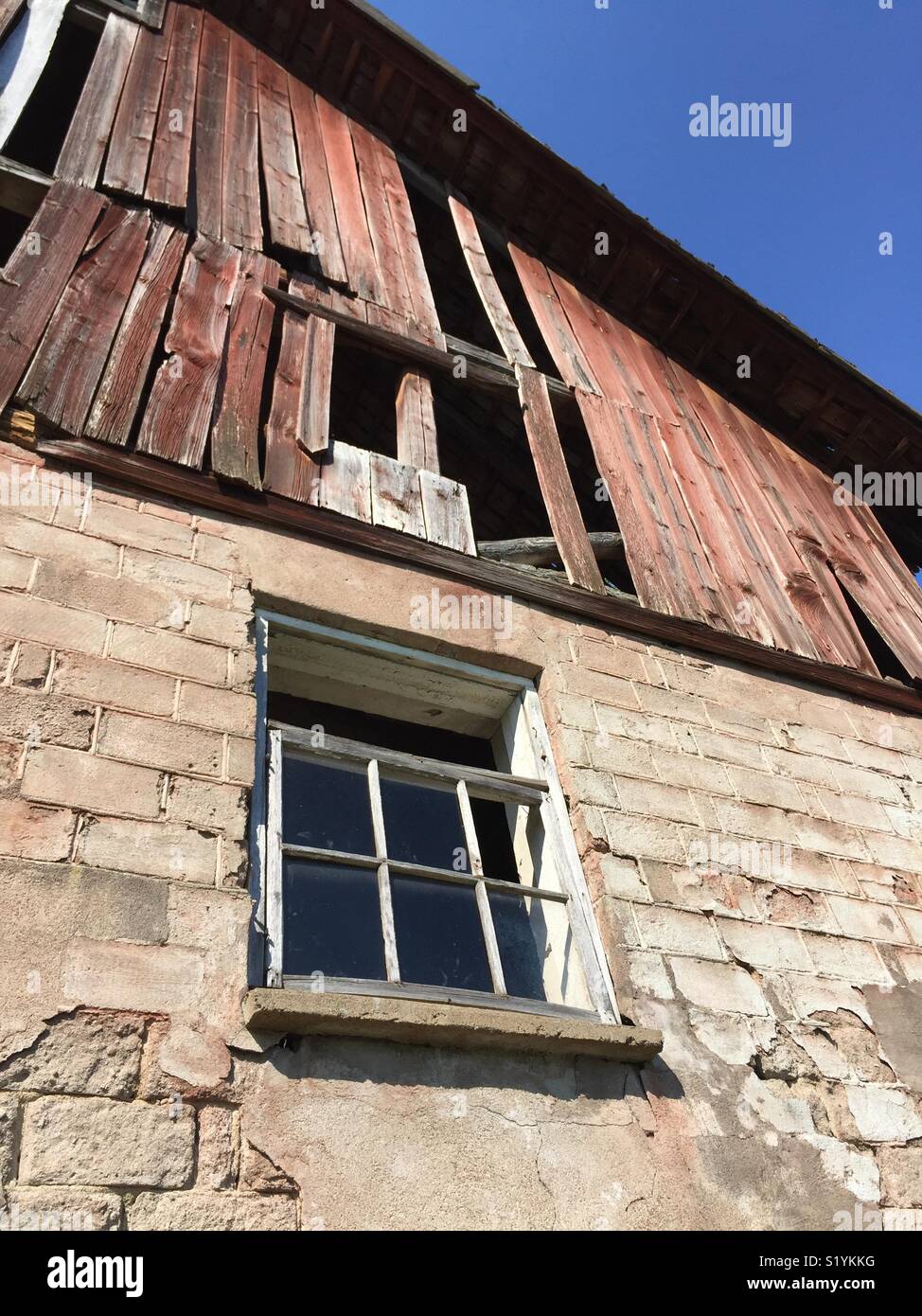 The hens’ window in the old derelict barn. - Smartphone Captured Stock Image