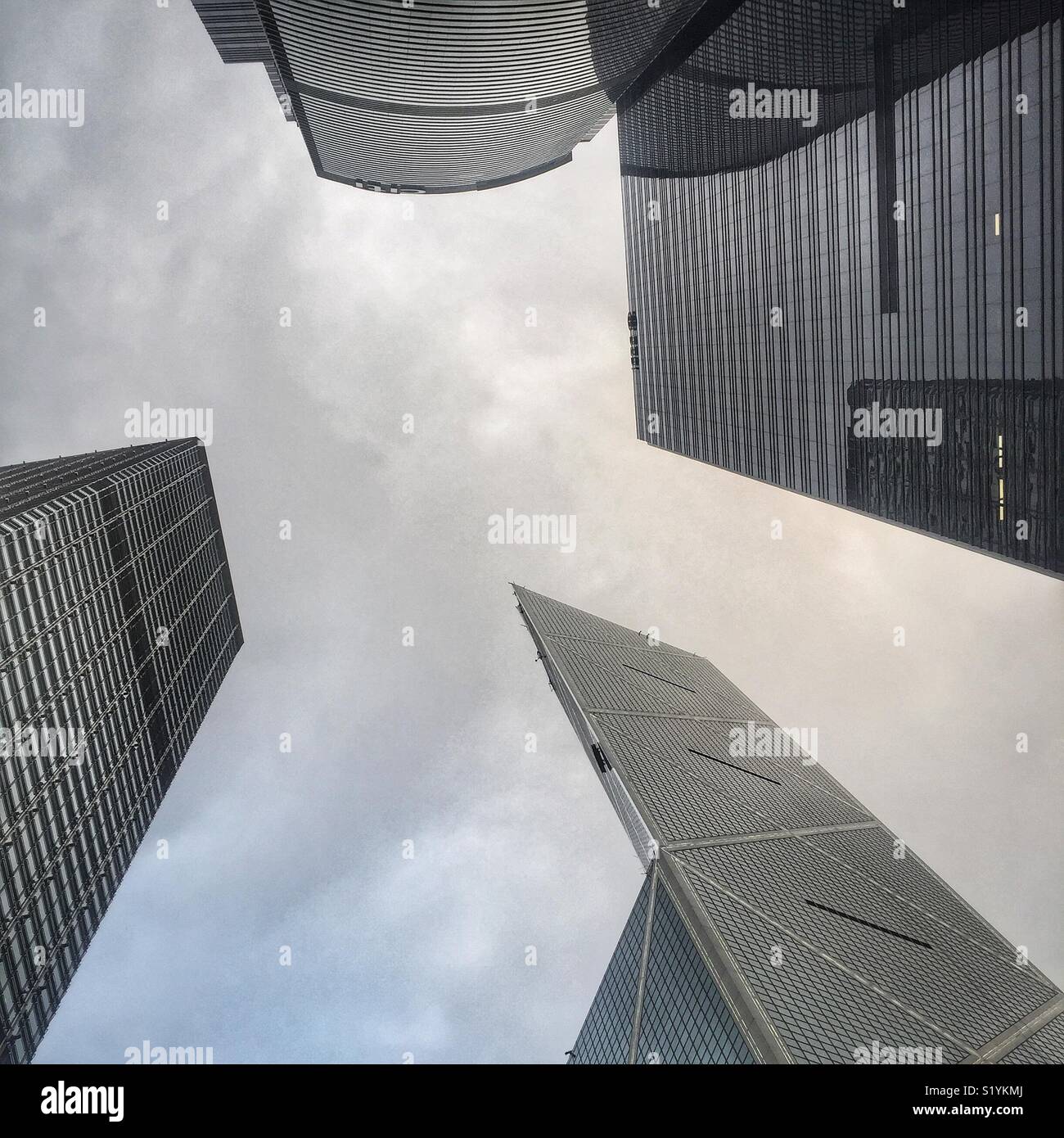 Highrise office buildings in Admiralty, Central, Hong Kong Island. Clockwise from top: Champion Tower and ICBC Tower in Three Garden Road; Bank of China; Cheung Kong Center - Smartphone Captured Stock Image