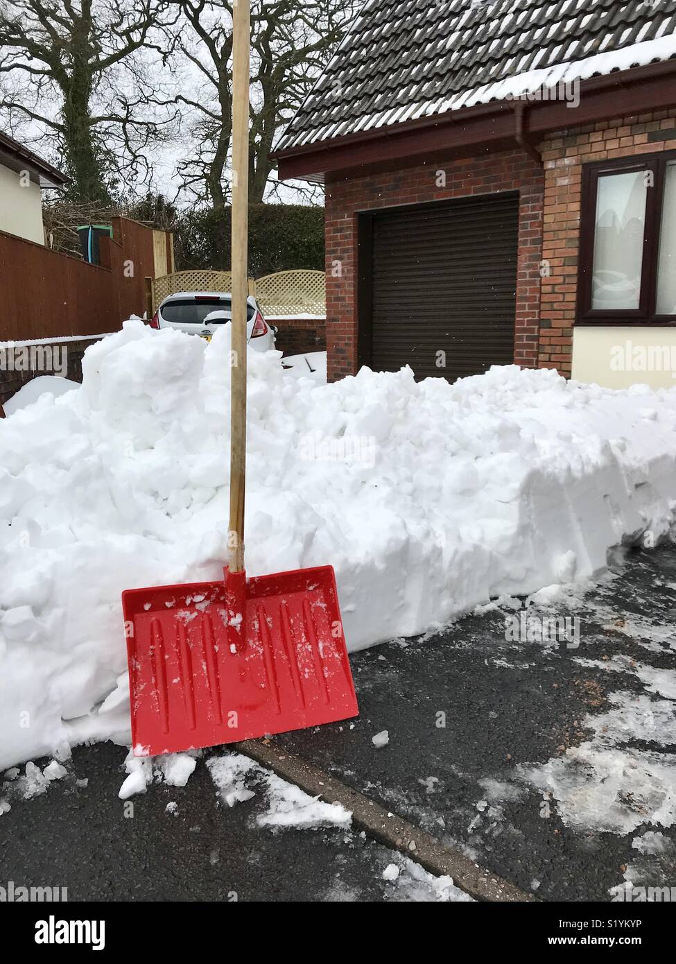 Job done! Snow cleared from a driveway with a large plastic snow shovel - Smartphone Captured Stock Image
