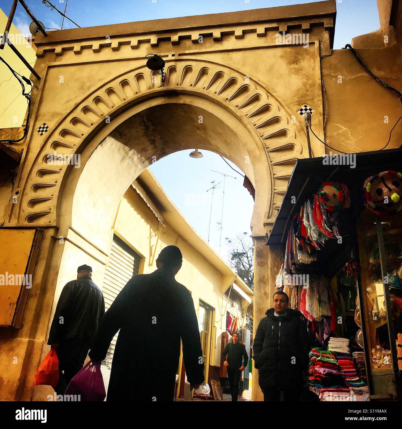 People walk in the city of Tangier, in Morroco, Africa Stock Photo