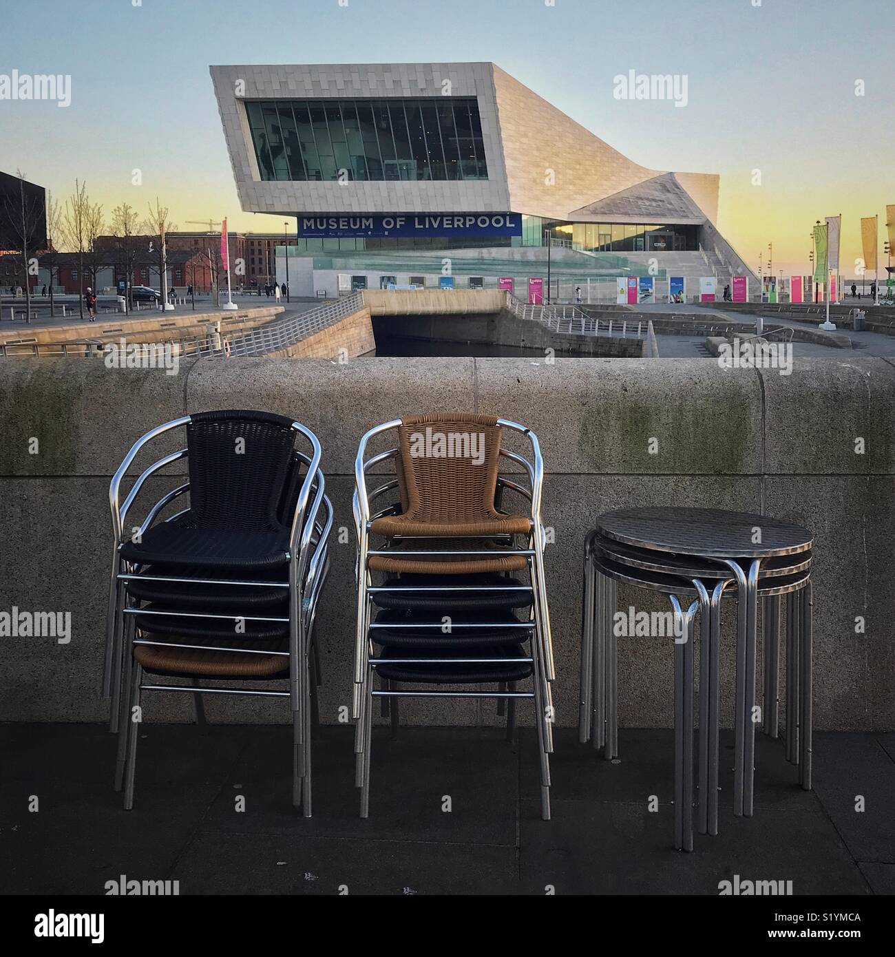 Chairs and tables stacked outside Liverpool museum Stock Photo Alamy