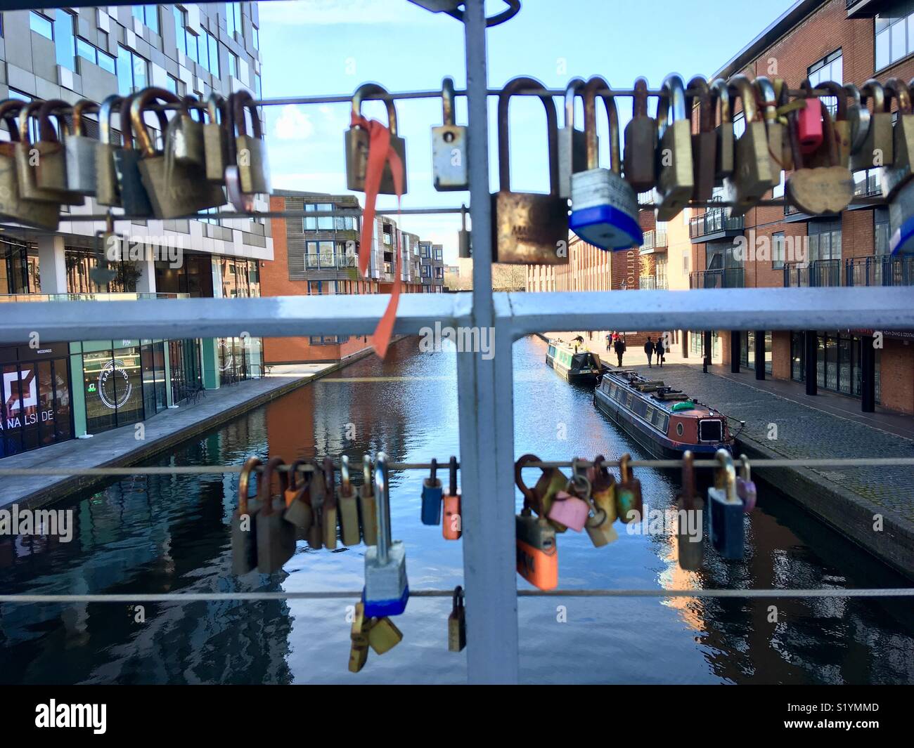 Salvage Turn Bridge, or ‘Lover’s Bridge’ with valentine padlocks, behind The Cube, Birmingham - Smartphone Captured Stock Image
