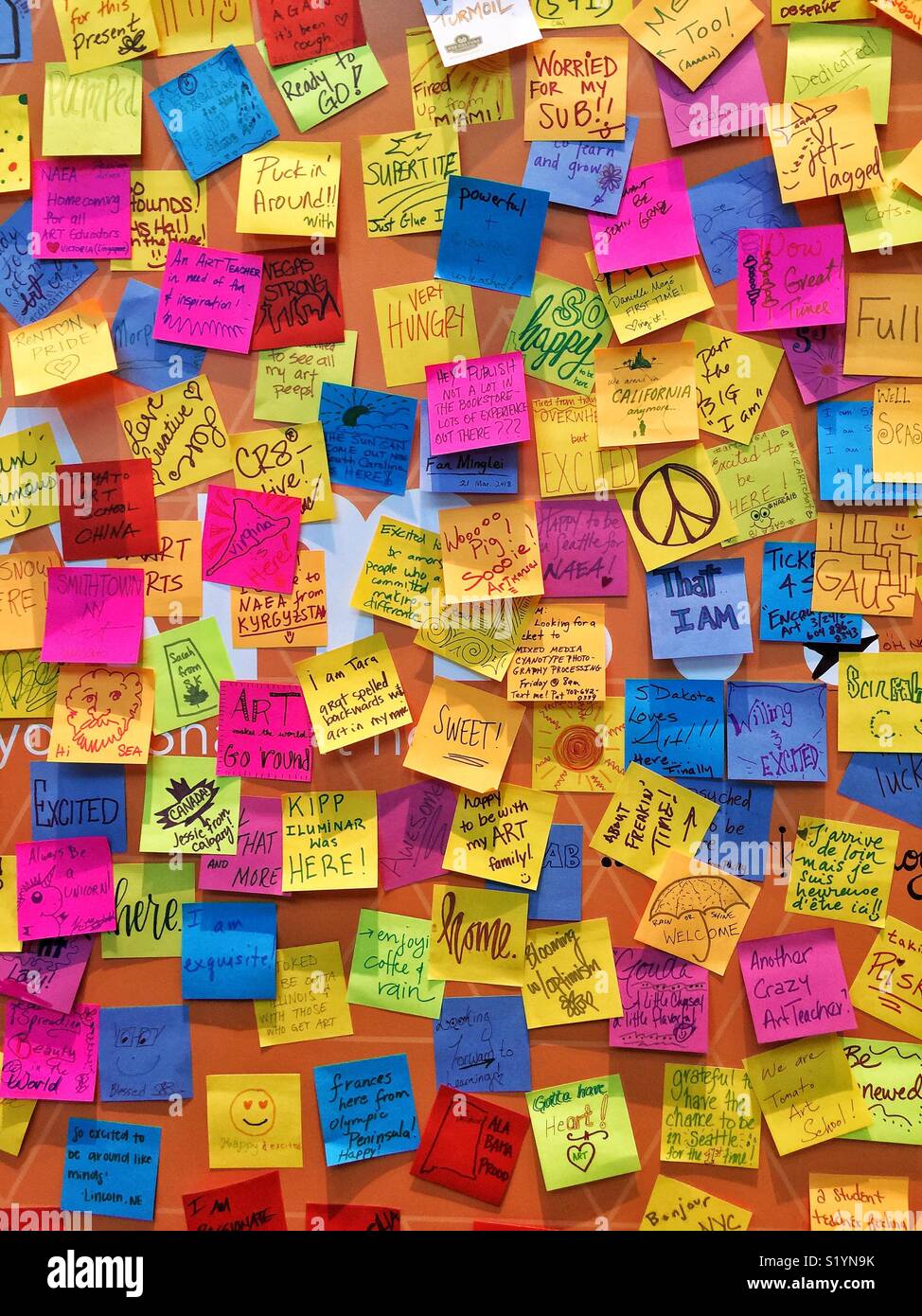 Wall with colorful sticky notes Stock Photo