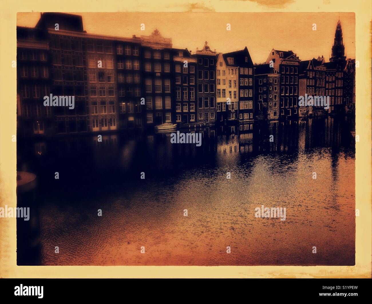 Vintage style atmospheric Amsterdam typical architecture and canal - Smartphone Captured Stock Image