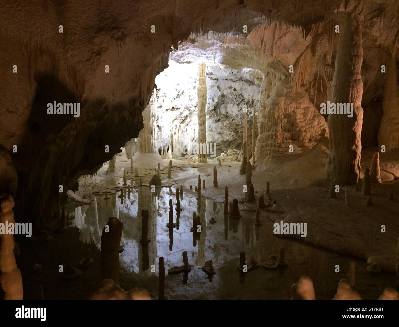 Stalactites and stalagmites in Frasassi Caves, in Genga, Italy, Europe - Smartphone Captured Stock Image