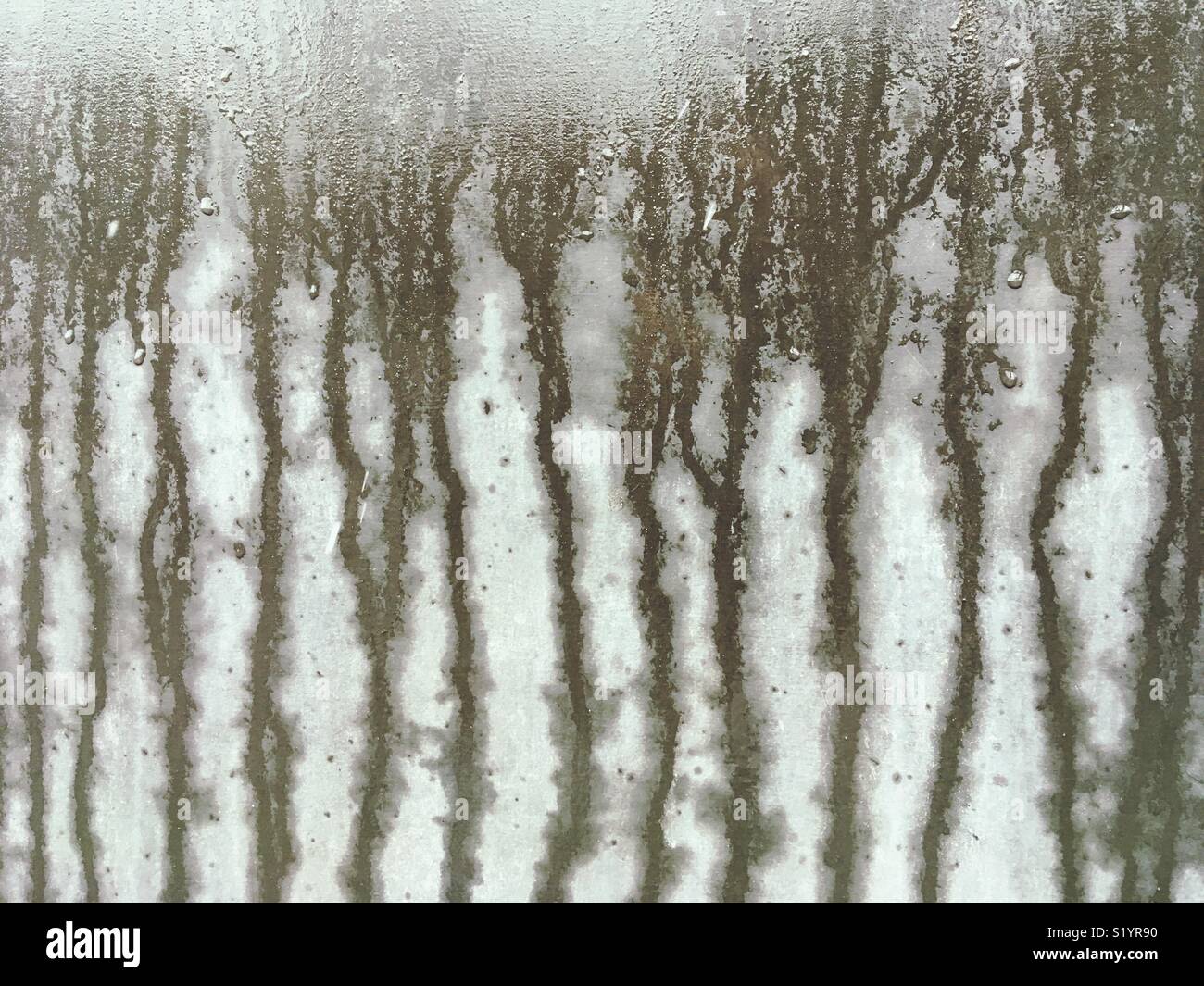 Water running down a concrete wall - Smartphone Captured Stock Image