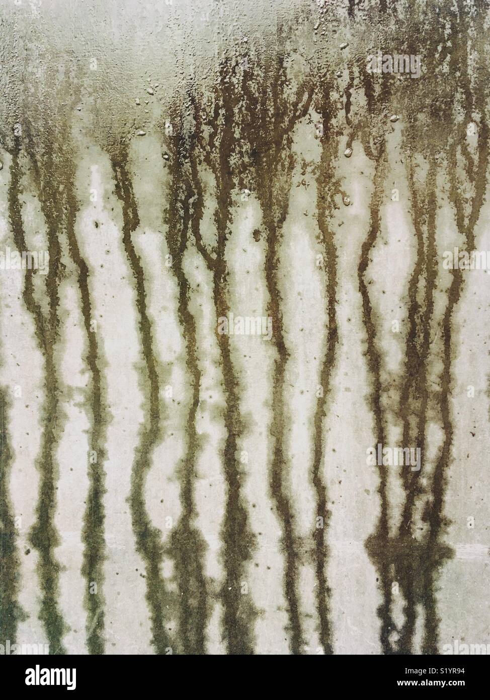 Water running down a concrete wall - Smartphone Captured Stock Image