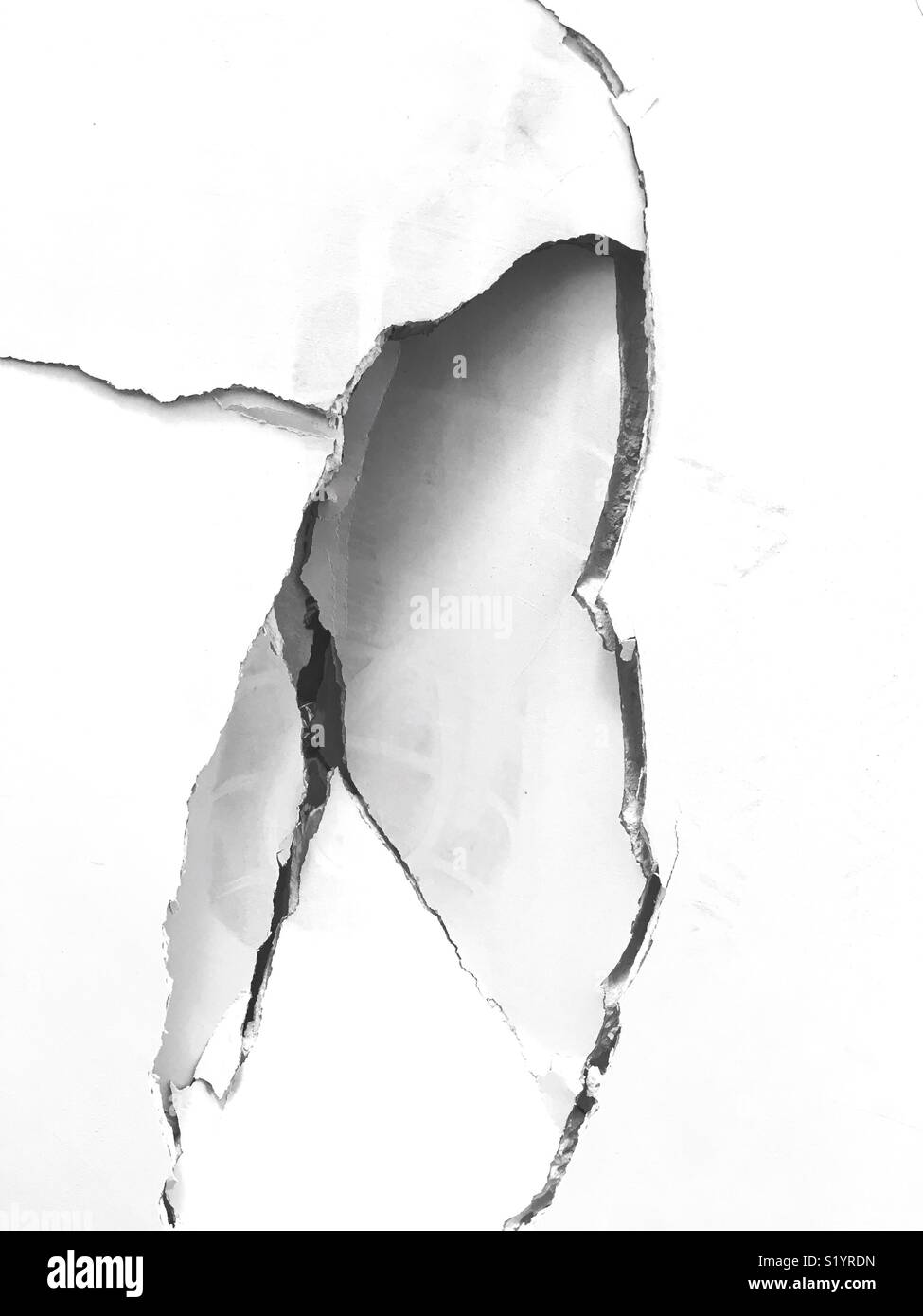A hole in a wall, a kicked in wall Stock Photo Alamy