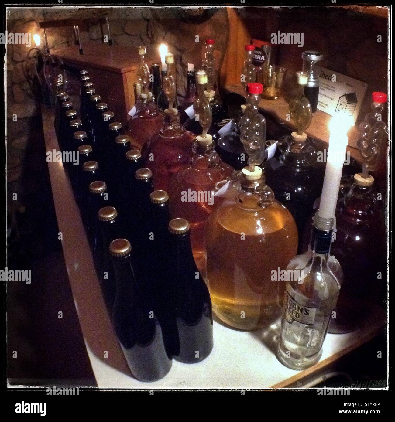 Inoculating homemade Macabeo sparkling wine with yeast for a bottle fermentation, Catalonia, Spain. - Smartphone Captured Stock Image