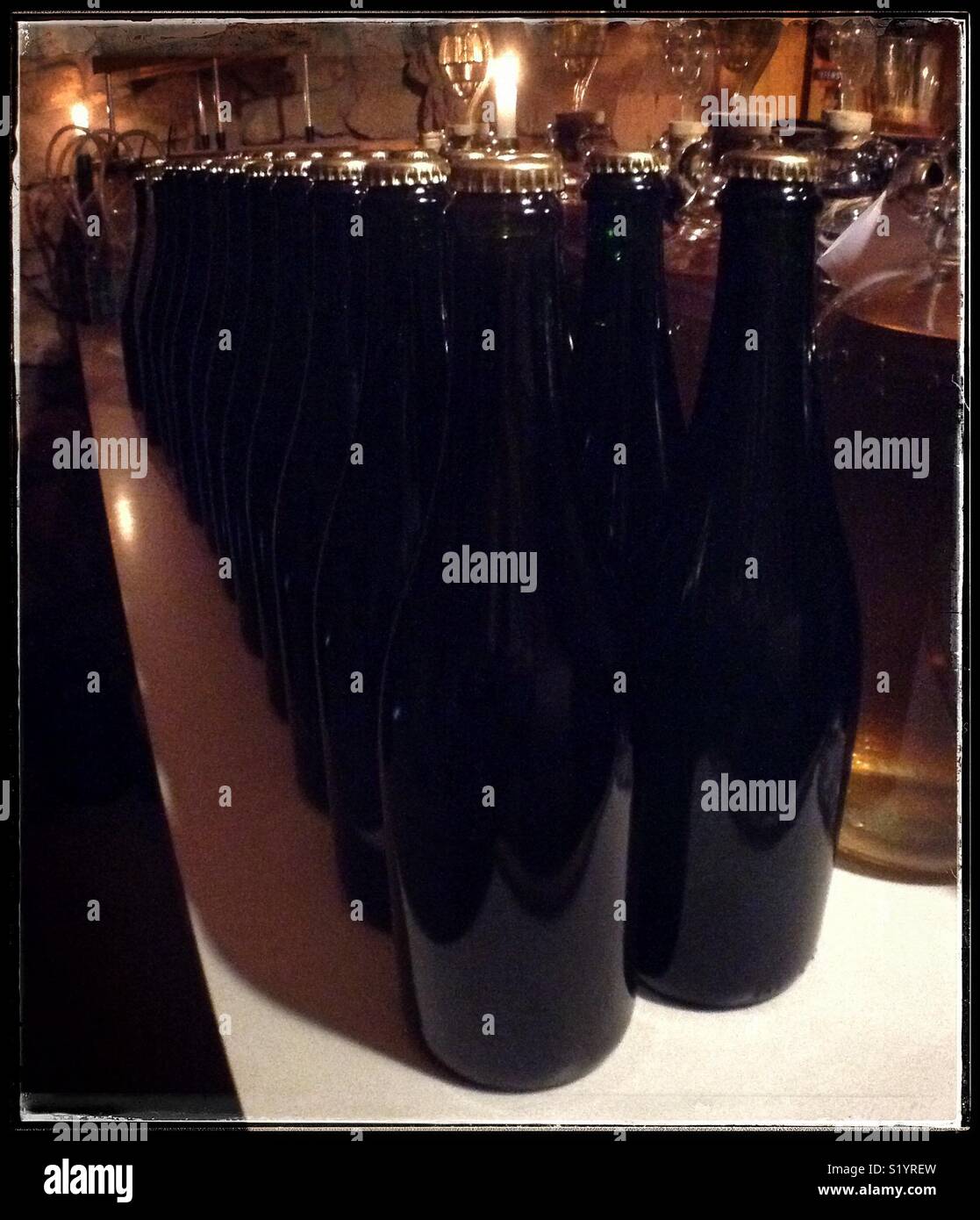 Inoculating homemade Macabeo sparkling wine with yeast for a bottle fermentation, Catalonia, Spain. - Smartphone Captured Stock Image