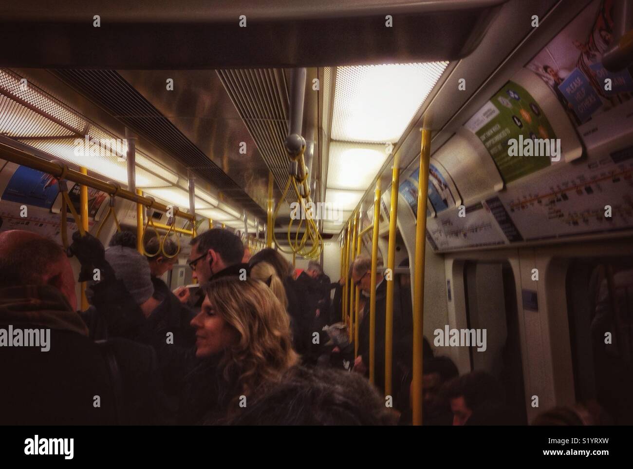 Onboard a busy London Underground train. - Smartphone Captured Stock Image