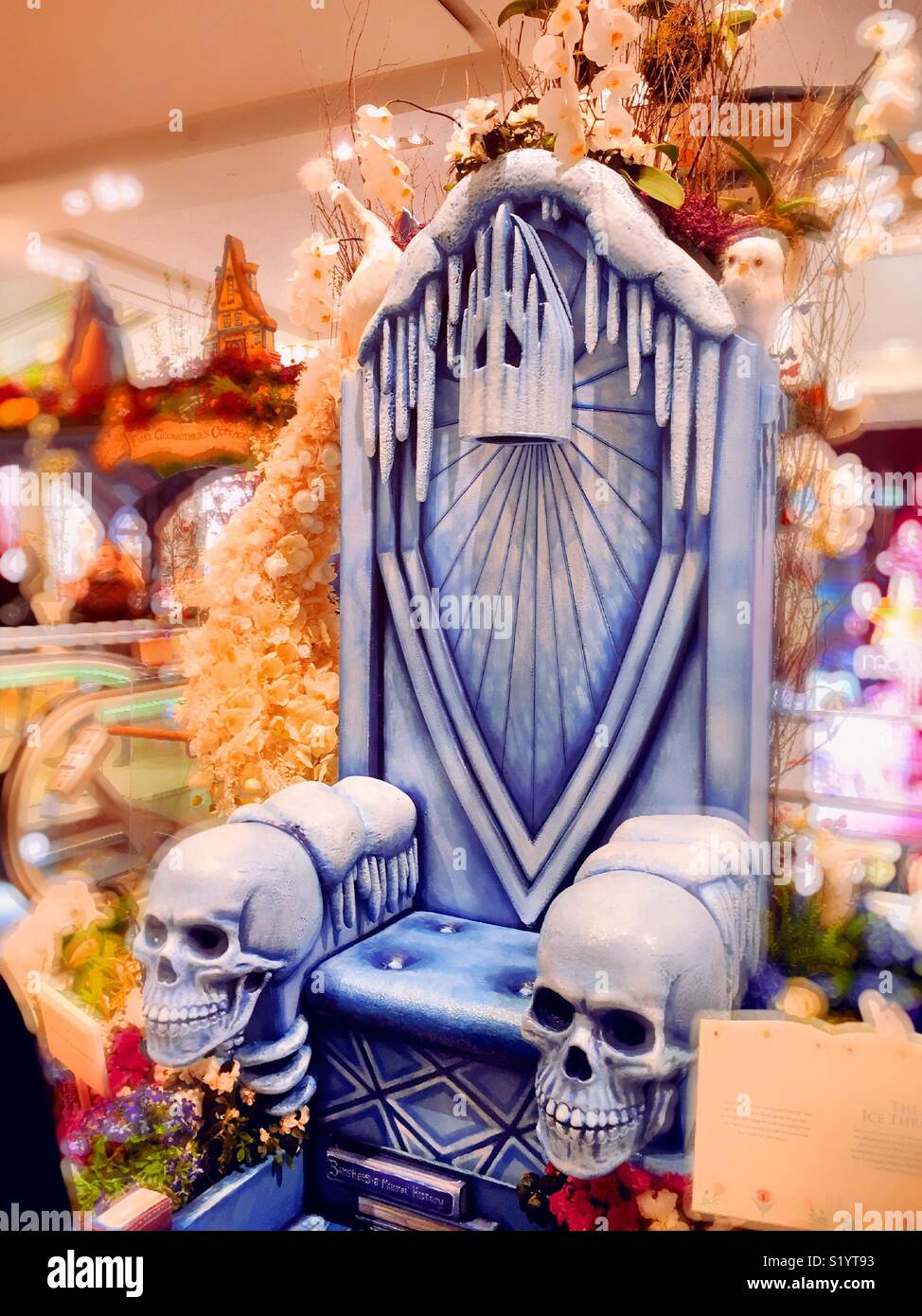 Skull throne photography opportunity area at Macy’s annual Easter flower show, main floor, Herald Square, New York City, USA - Smartphone Captured Stock Image