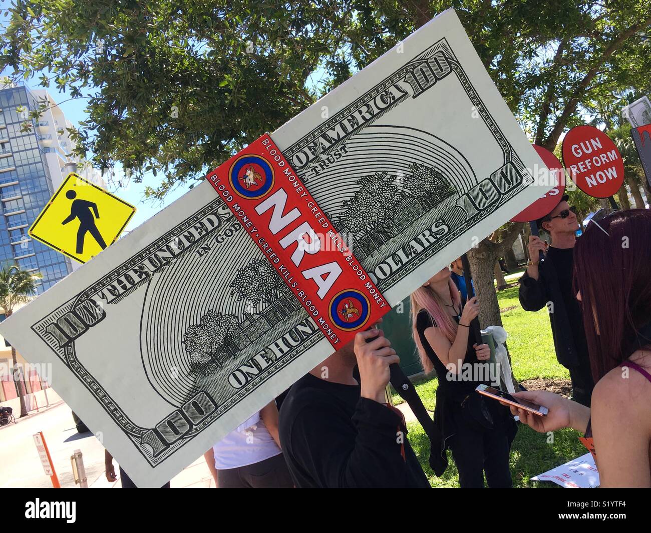 Miami Beach Florida “March For Our Lives.”  March 24, 2018 protest after Parkland, Florida school shootings. - Smartphone Captured Stock Image