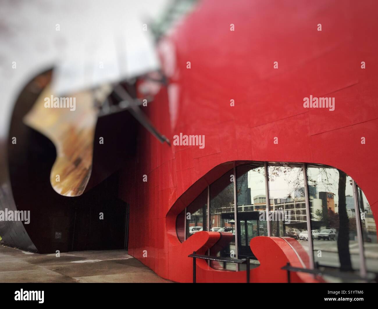 Red and gold walls of MoPop museum by architect Frank Gehry in Seattle
