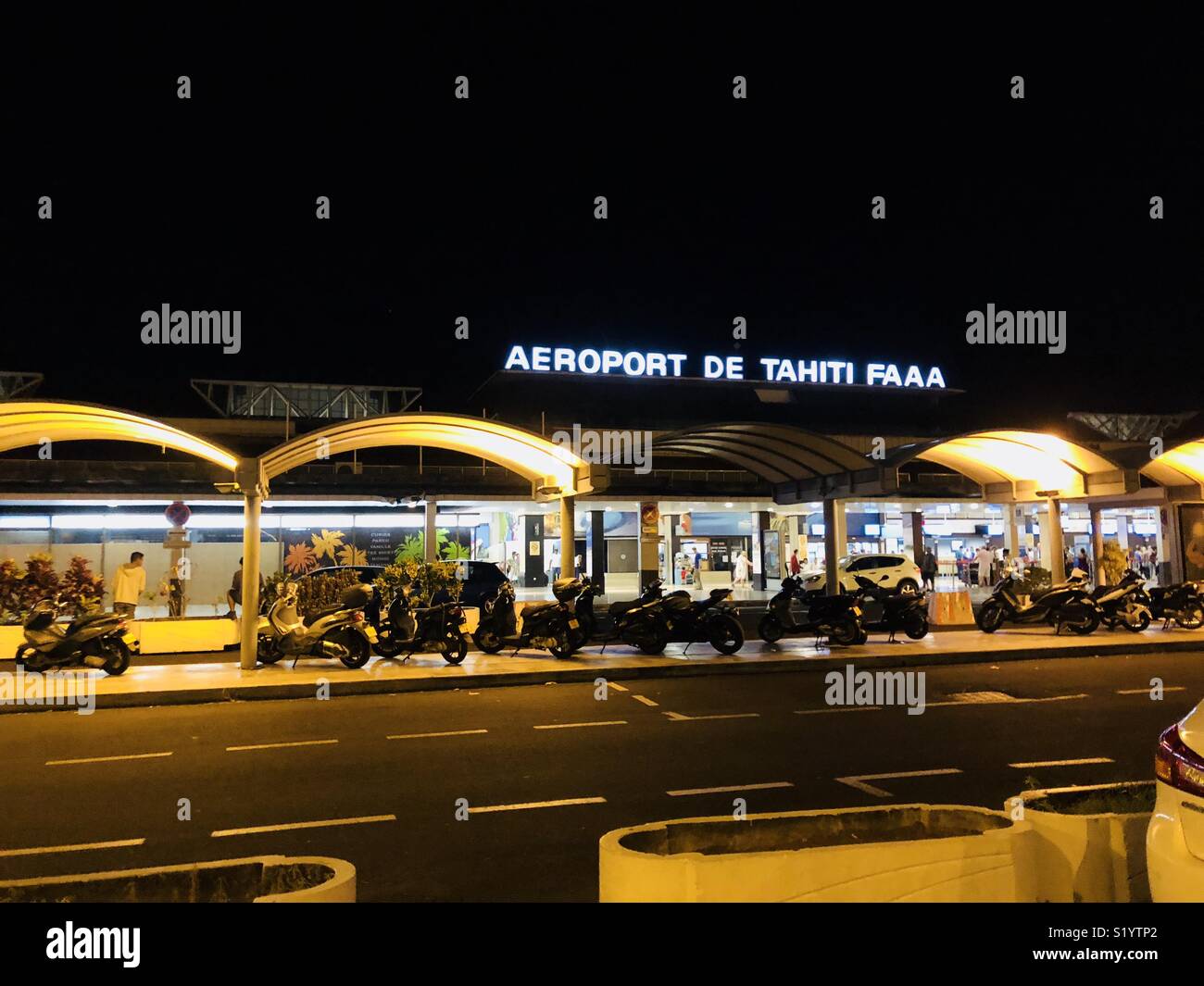 Outside Airport of Papeete, Tahiti, French Polynesia at Night Stock