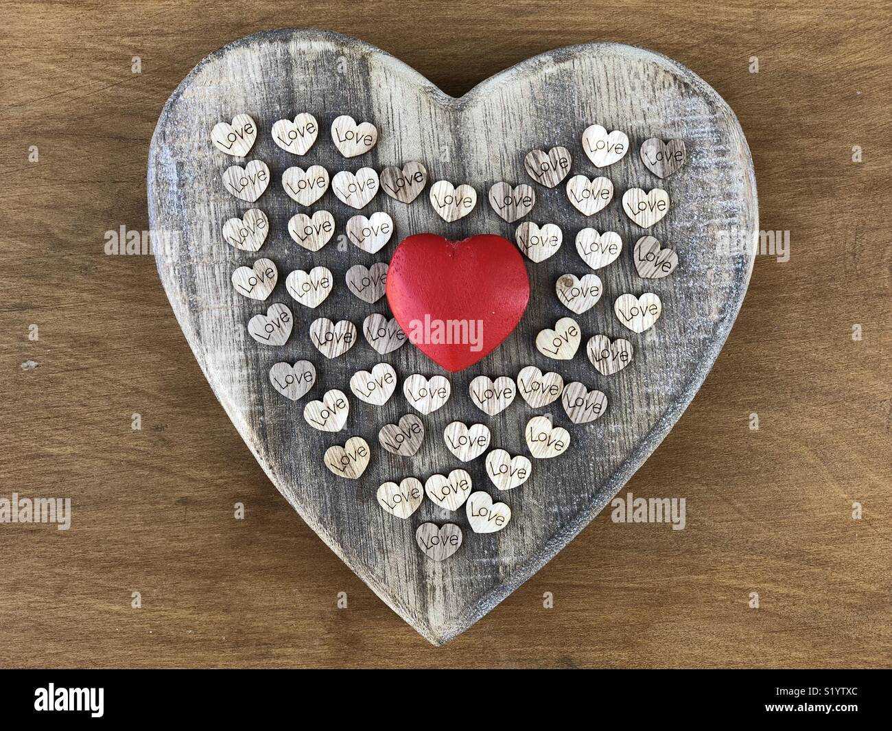 Love concept with wooden hearts Stock Photo