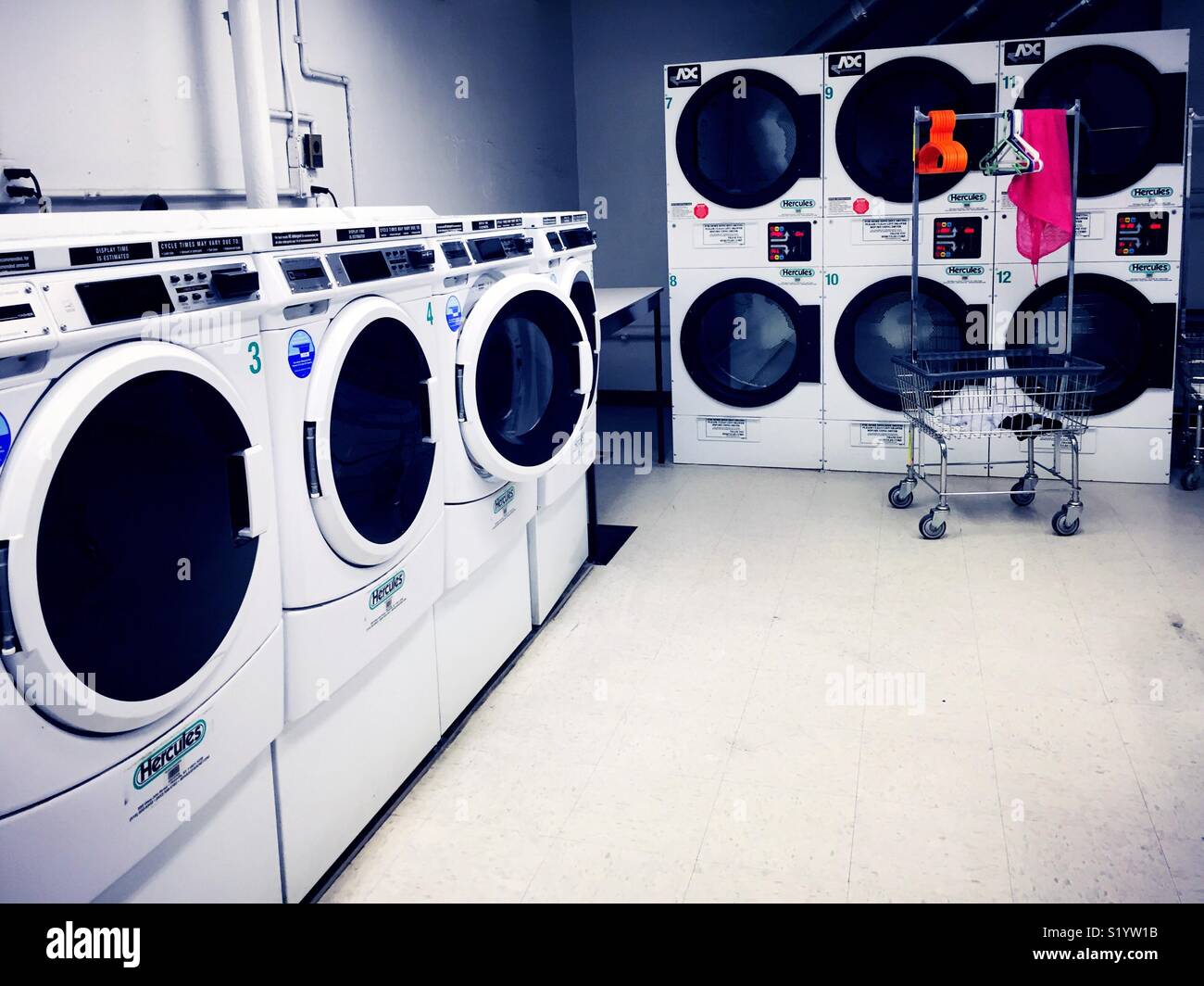 Frontloading washers and dryer‘s in a commercial laundromat, United