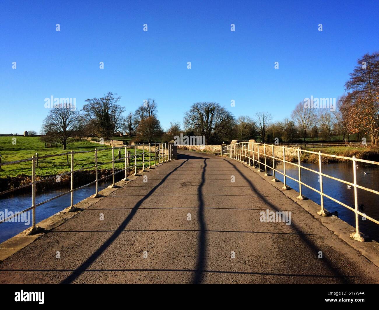 Bridge over the River Coln at Fairford Cotswolds UK - Smartphone Captured Stock Image