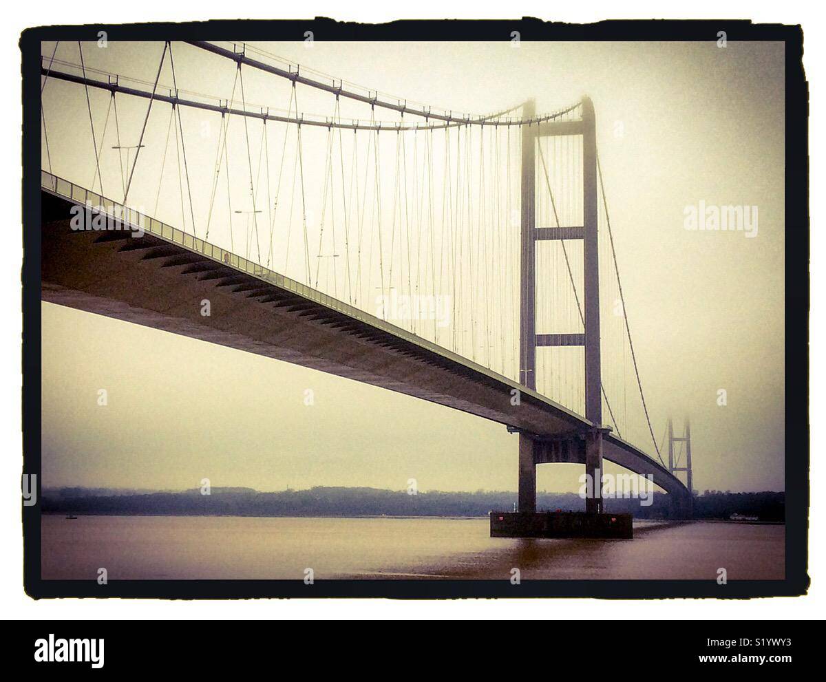 Monochromatic view of the Humber Bridge a Suspension Bridge linking Lincolnshire with East Yorkshire in northern England UK - Smartphone Captured Stock Image