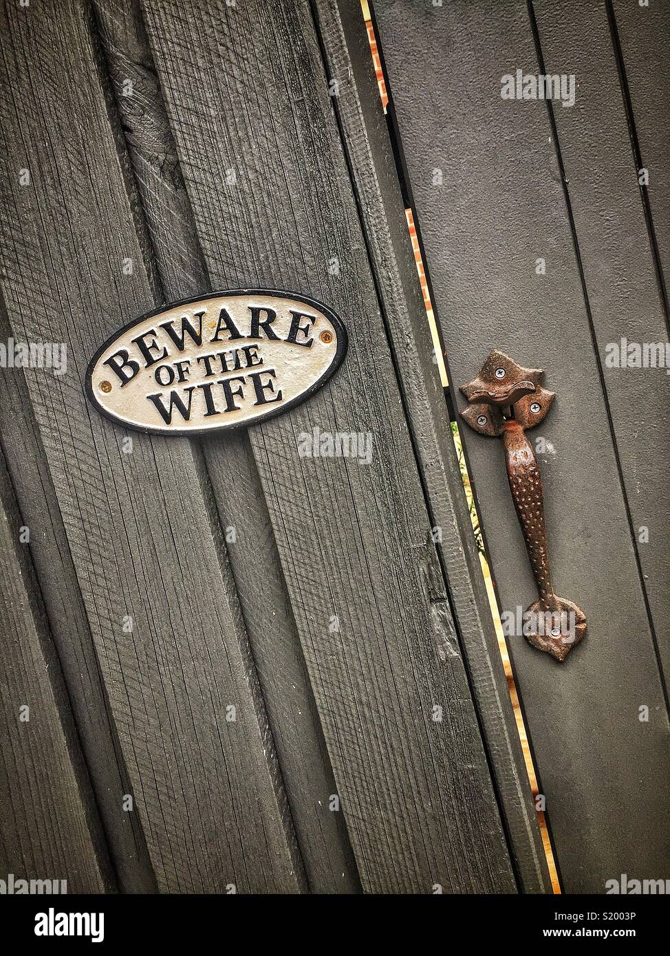 Humorous sign on a gate in Sydney, Australia - Smartphone Captured Stock Image