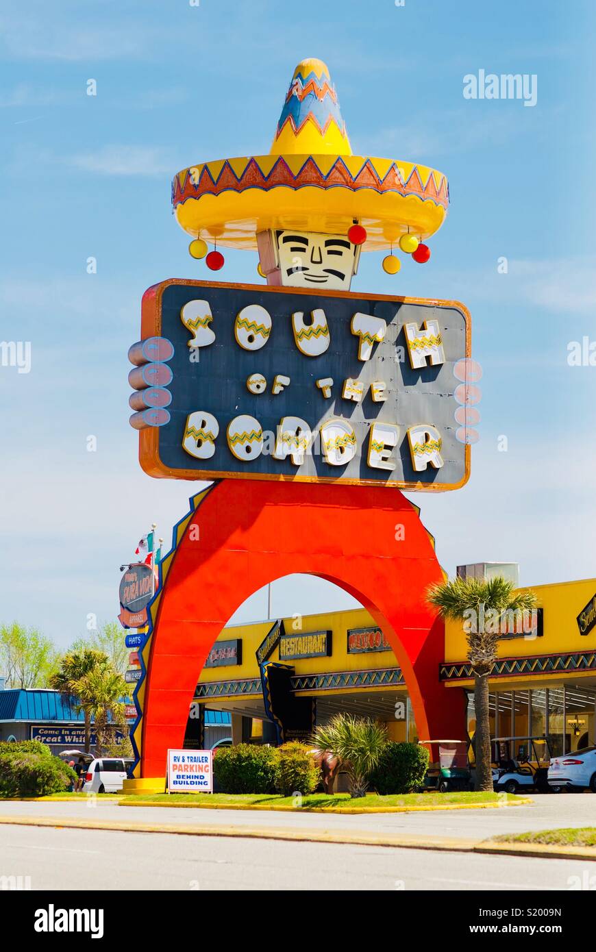 This huge neon sign advertises the “South of the Border” tourist attraction in South Carolina just south of the North Carolina state line in the United States along Interstate 95. Stock Photo