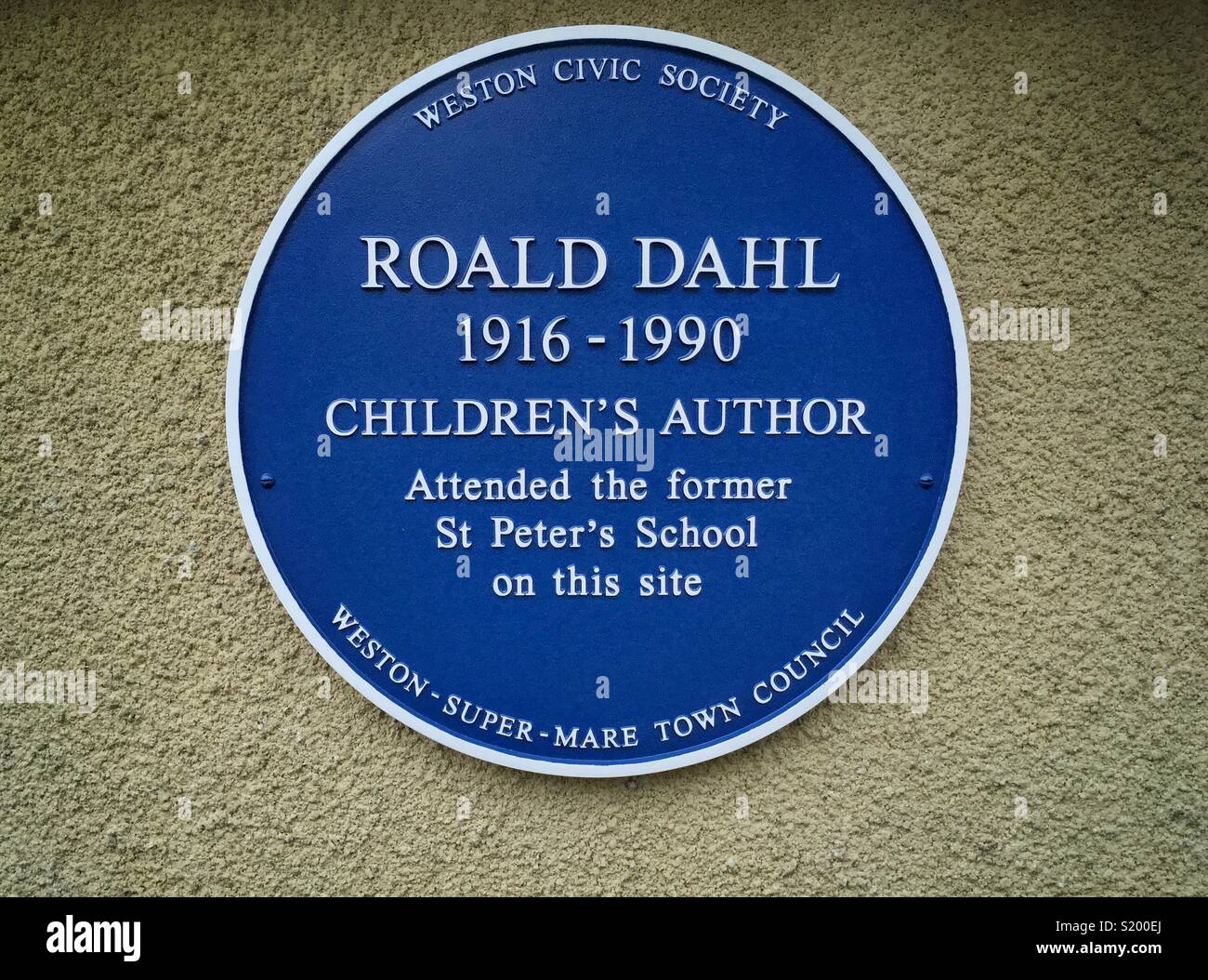A recently-installed blue plaque commemorating author Roald Dahl’s time at St Peter’s School in Weston-super-Mare, UK - Smartphone Captured Stock Image