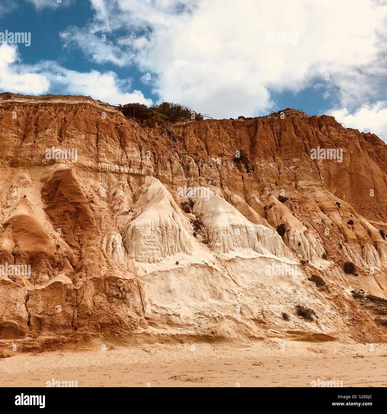 Cliff formation in Algarve, Portugal. Stock Photo