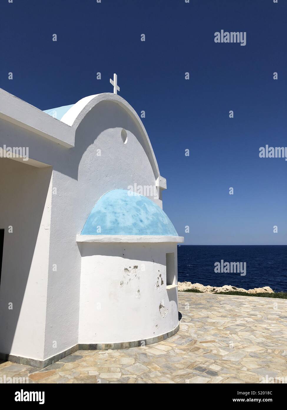 A tiny white church on Capo Greko on Cyprus - Smartphone Captured Stock Image