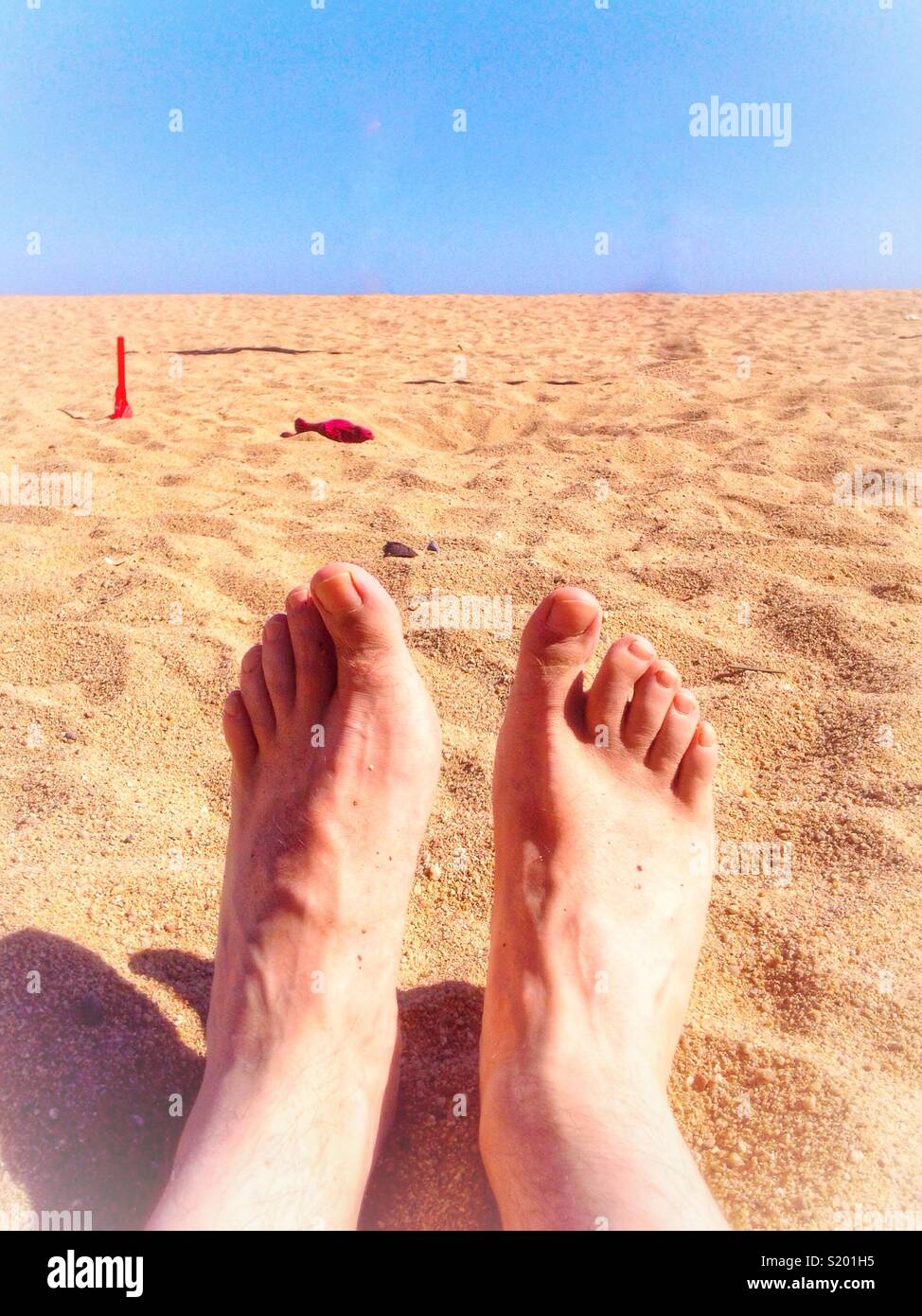 Relaxing on the beach. - Smartphone Captured Stock Image