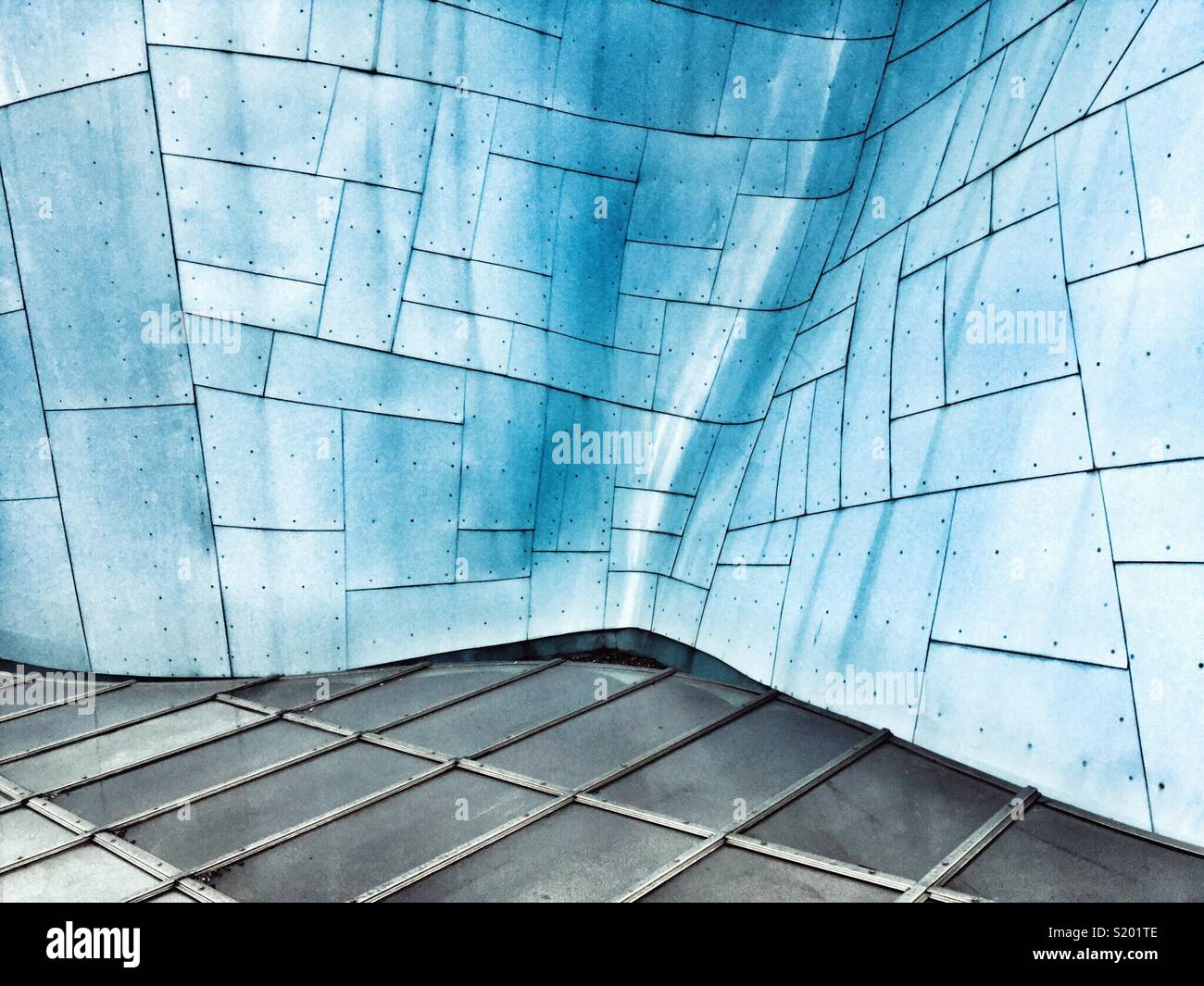Blue metal wall of MoPop museum in Seattle by architect Frank Gehry Stock Photo
