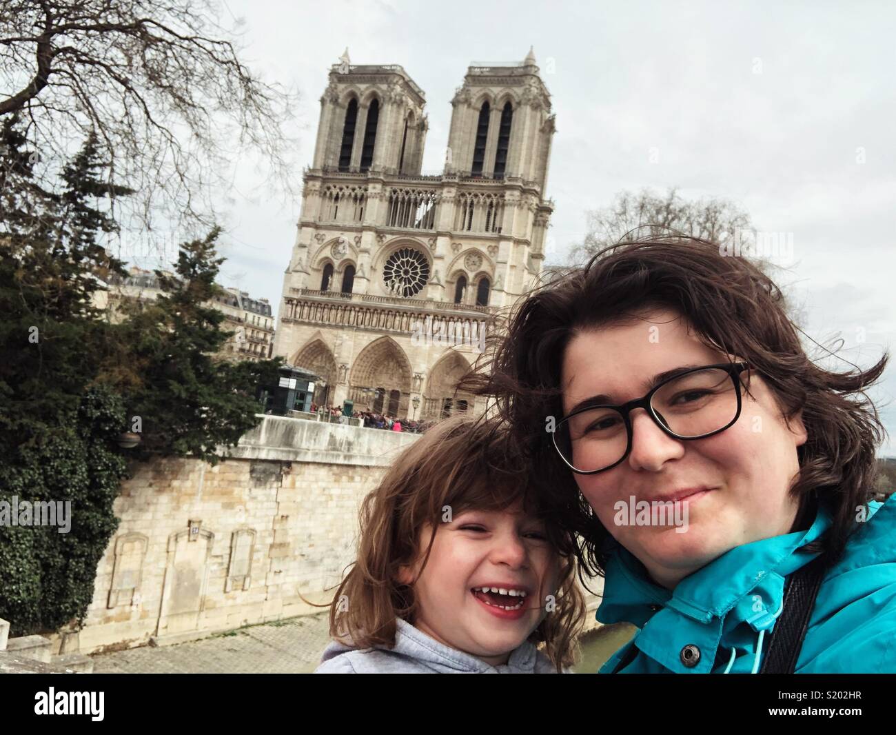 Mother and Children traveling Paris France - Smartphone Captured Stock Image