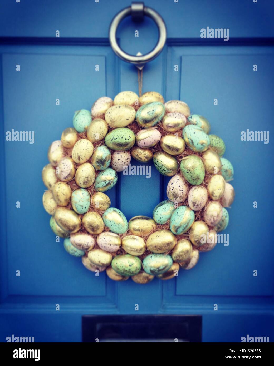 Easter wreath on the front door of a London house. UK - Smartphone Captured Stock Image