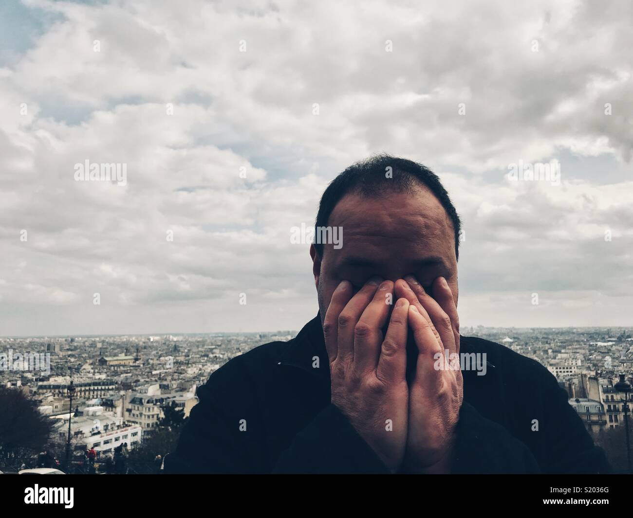Unhappy man Paris France - Smartphone Captured Stock Image