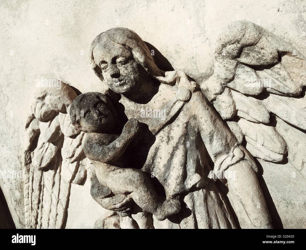 An Angel figure with child infant - Smartphone Captured Stock Image