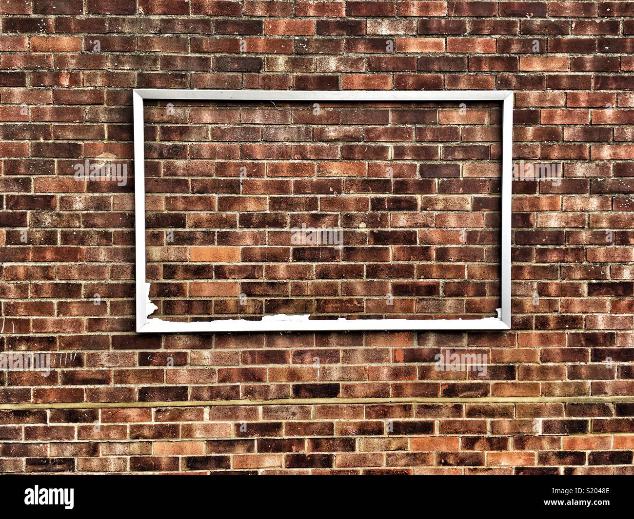 A frame on a brick wall Stock Photo Alamy