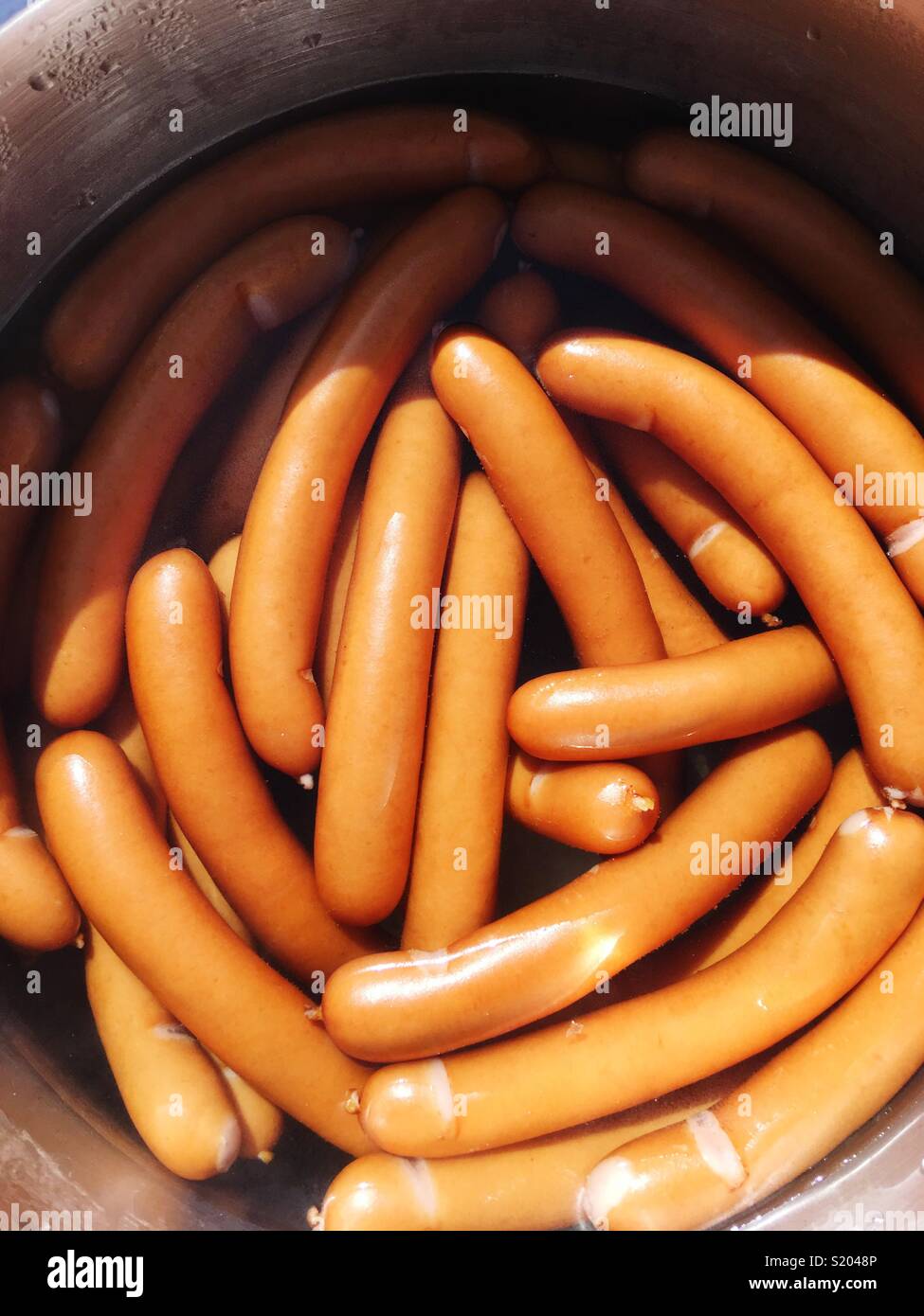 A pot full of weiner sausages Stock Photo