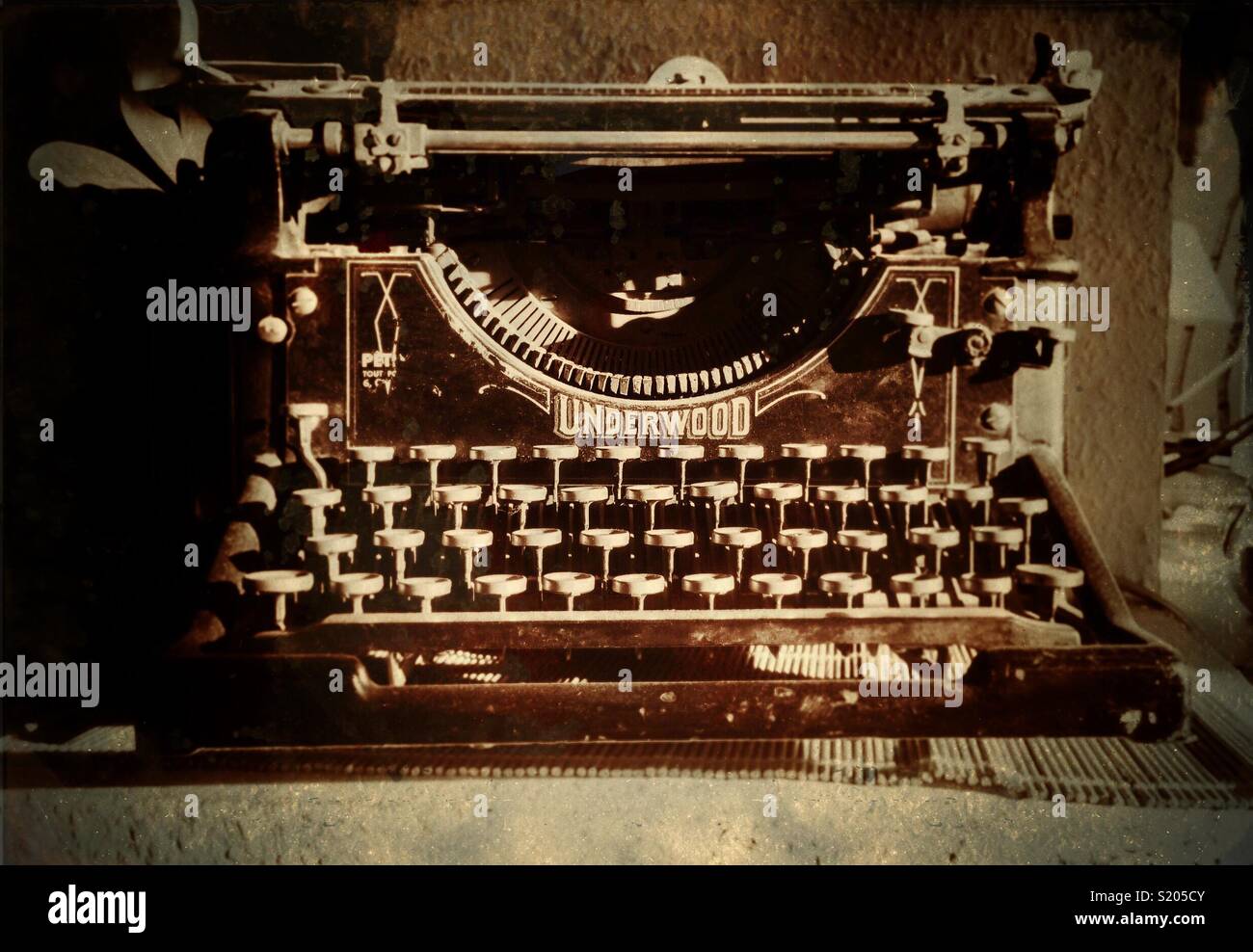 Monochromatic sepia picture of an old Underwood typewriter. - Smartphone Captured Stock Image