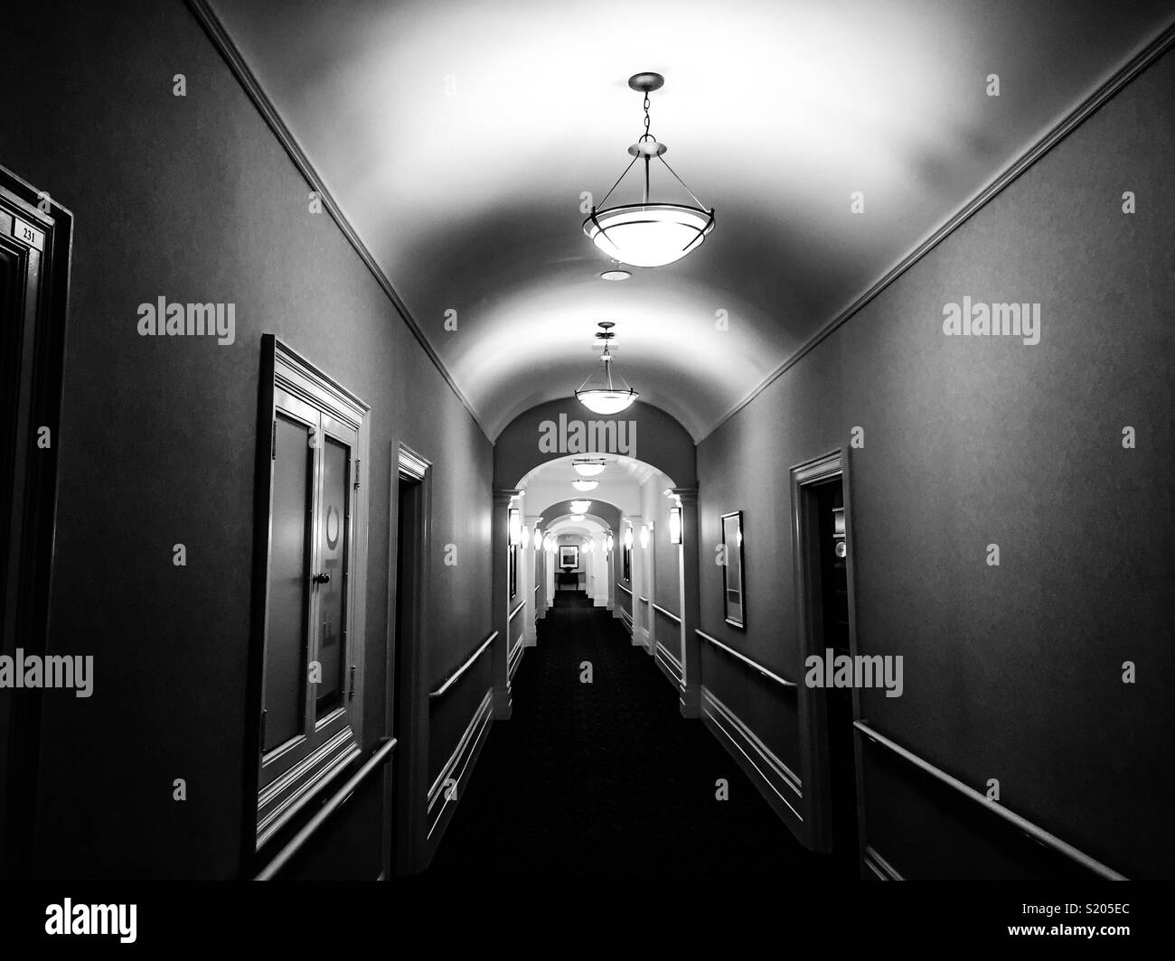 Long, well-lit corridor - Smartphone Captured Stock Image