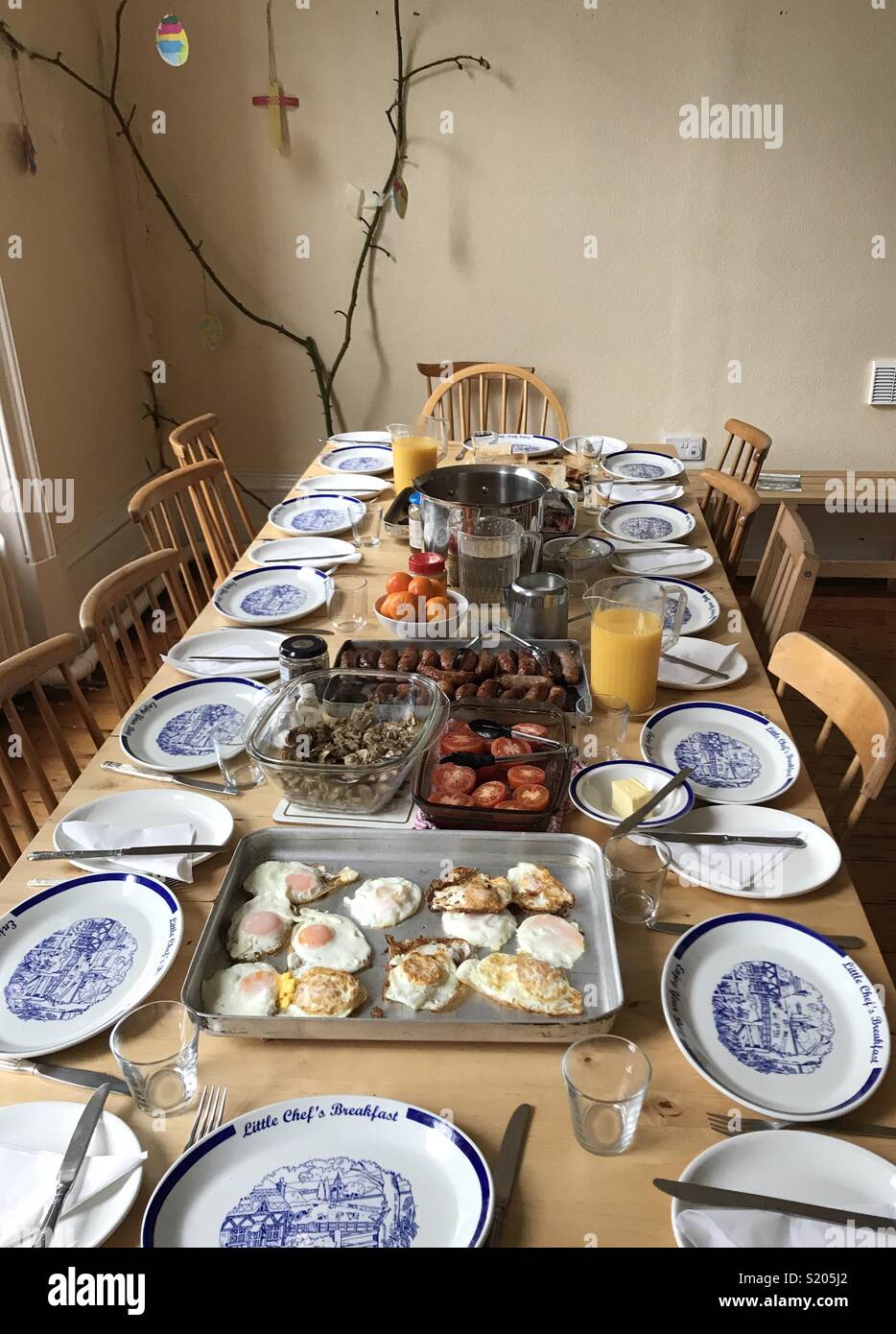 Full English breakfast for twelve with table and chairs Stock Photo Alamy