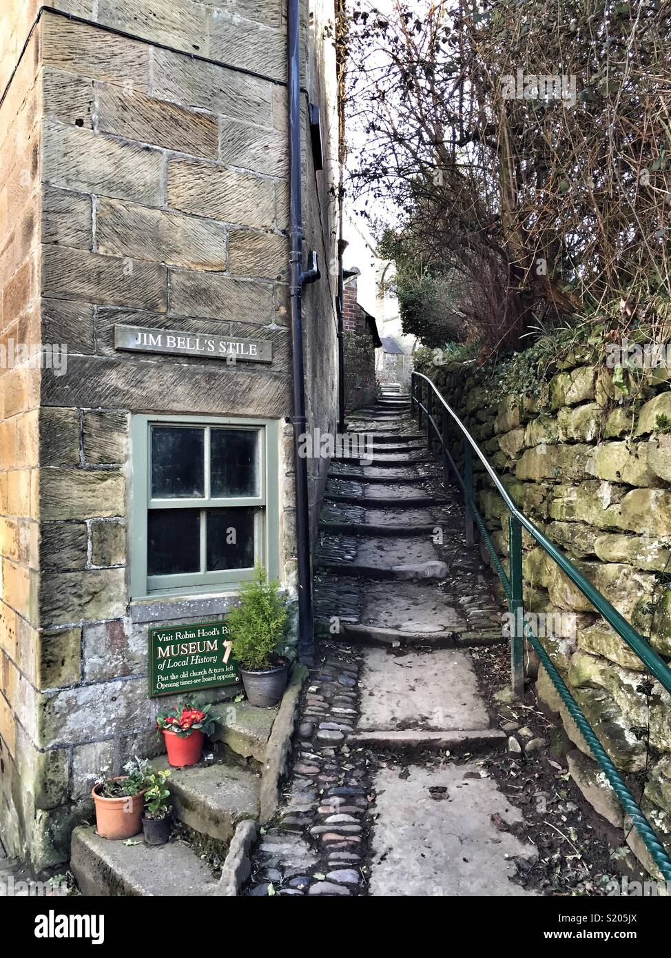 Jim Bell’s Stile, little pathway up to museum in Robin Hood’s Bay, North Yorkshire, UK - Smartphone Captured Stock Image