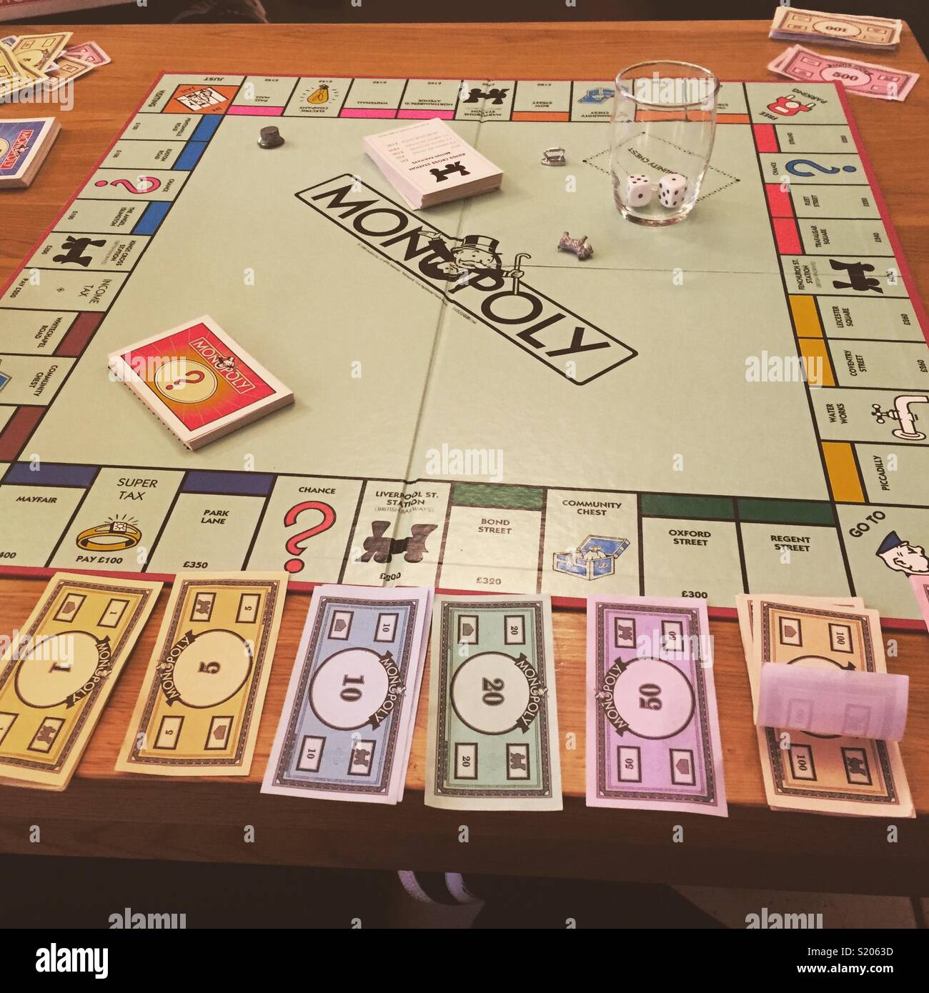 Monopoly game in progress Stock Photo