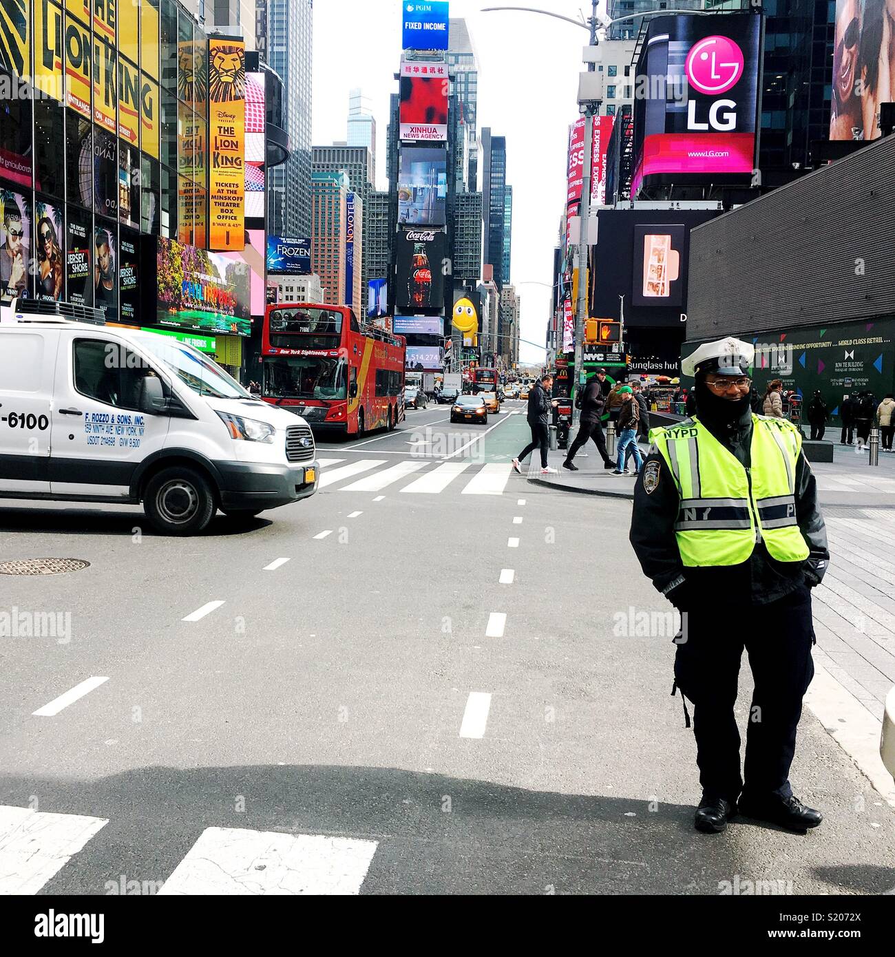 Police officer in Times Square - Smartphone Captured Stock Image