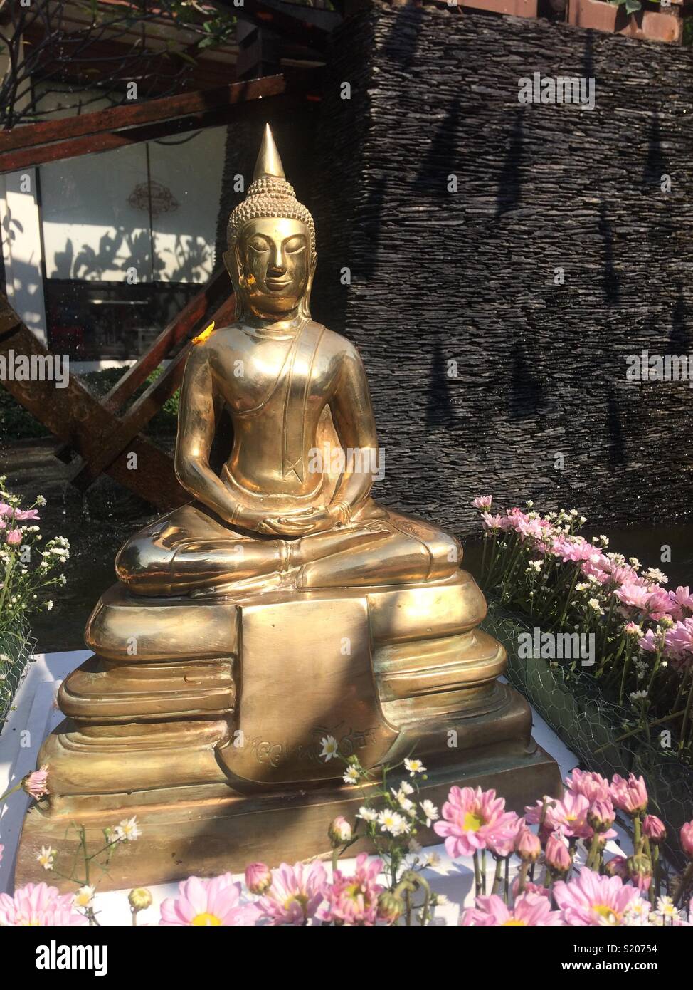 Bronze Buddha statuette in Udon Thani erected in UD Town for Songkran 2018 Stock Photo