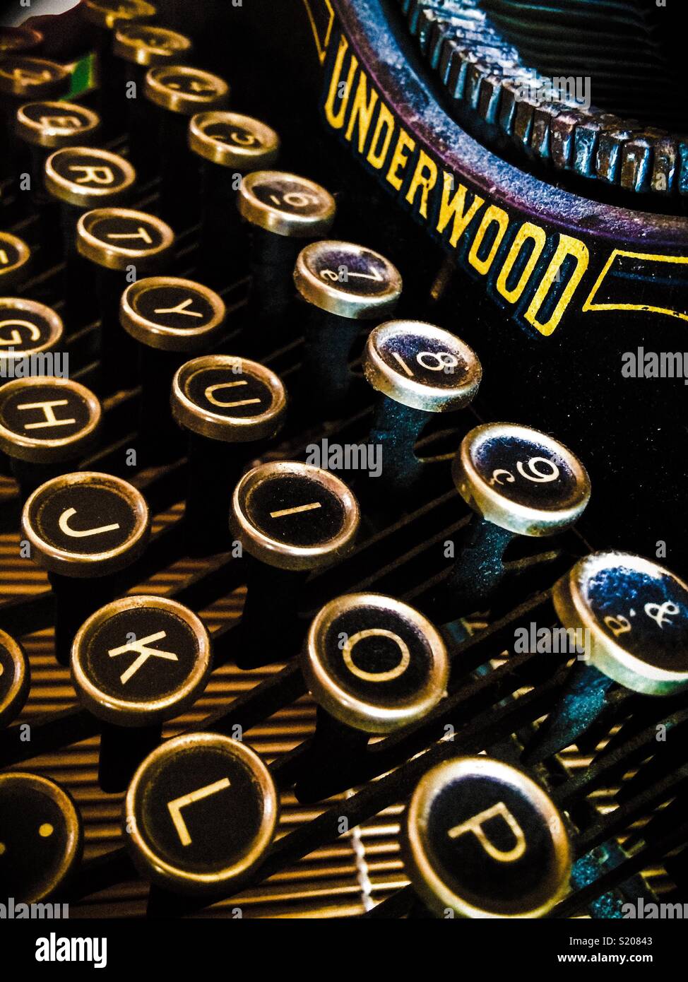 Close-up on an old Underwood typewriter with dust - Smartphone Captured Stock Image