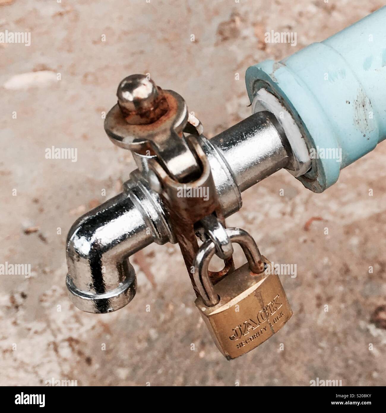 Locked water tap Stock Photo Alamy